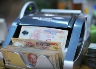 Việt Nam loay hoay trong vòng xoáy nợ xấu